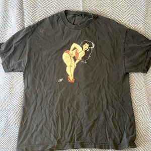 Well worn Coop Smoking bikini woman shirt.